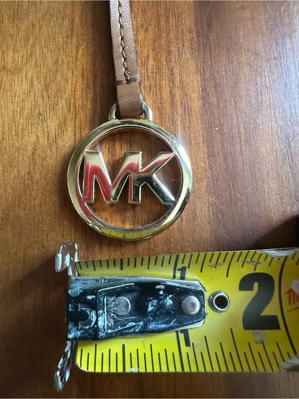 Michael Kors Brown Leather Strap Keyring with Gold MK Emblem and Red Inset
